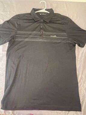 Travis Mathew Black Polo with Textured Chest Stripes